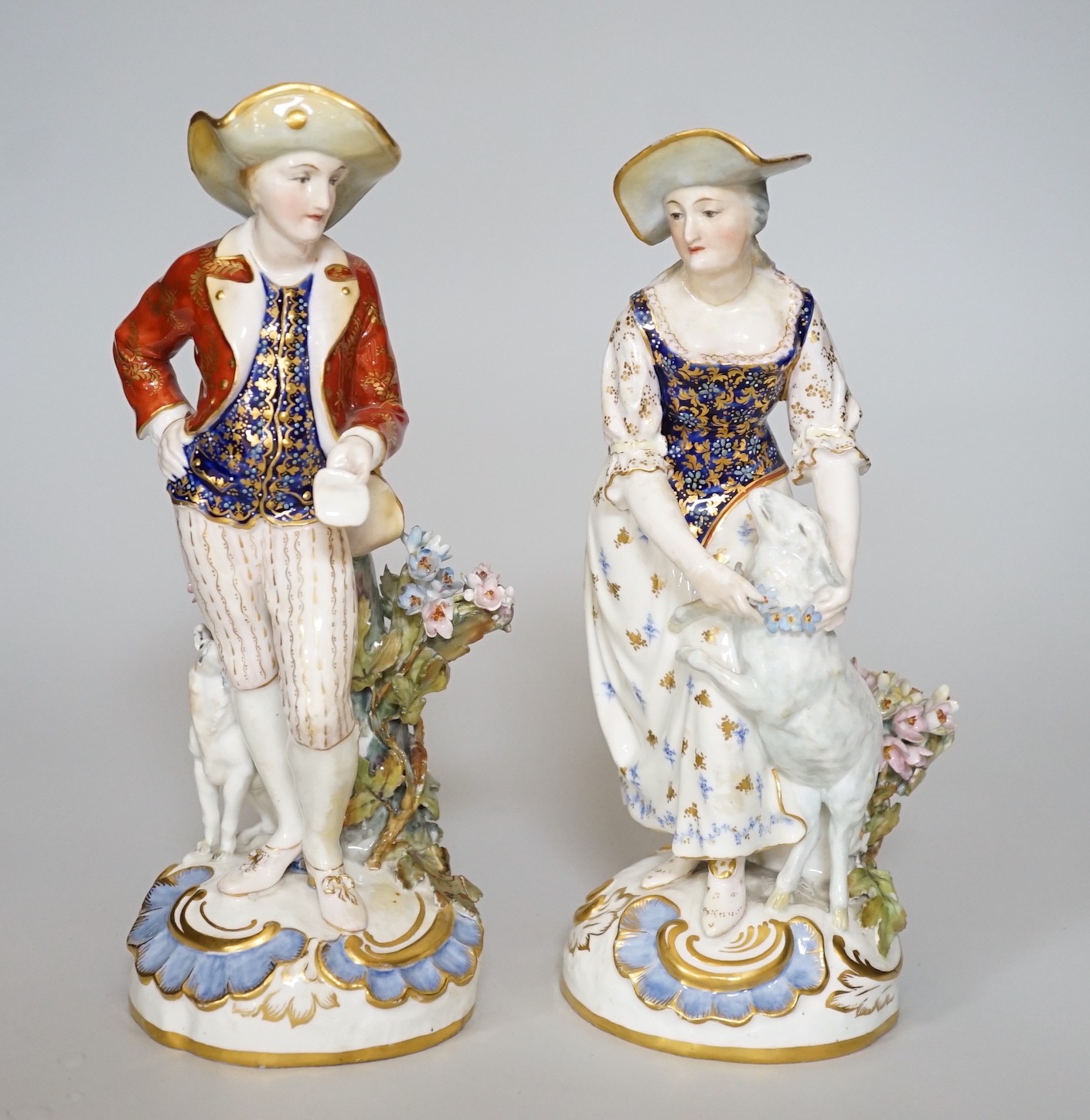 A pair of Royal Crown Derby figures of a Shepherd and shepherdess, 23cm